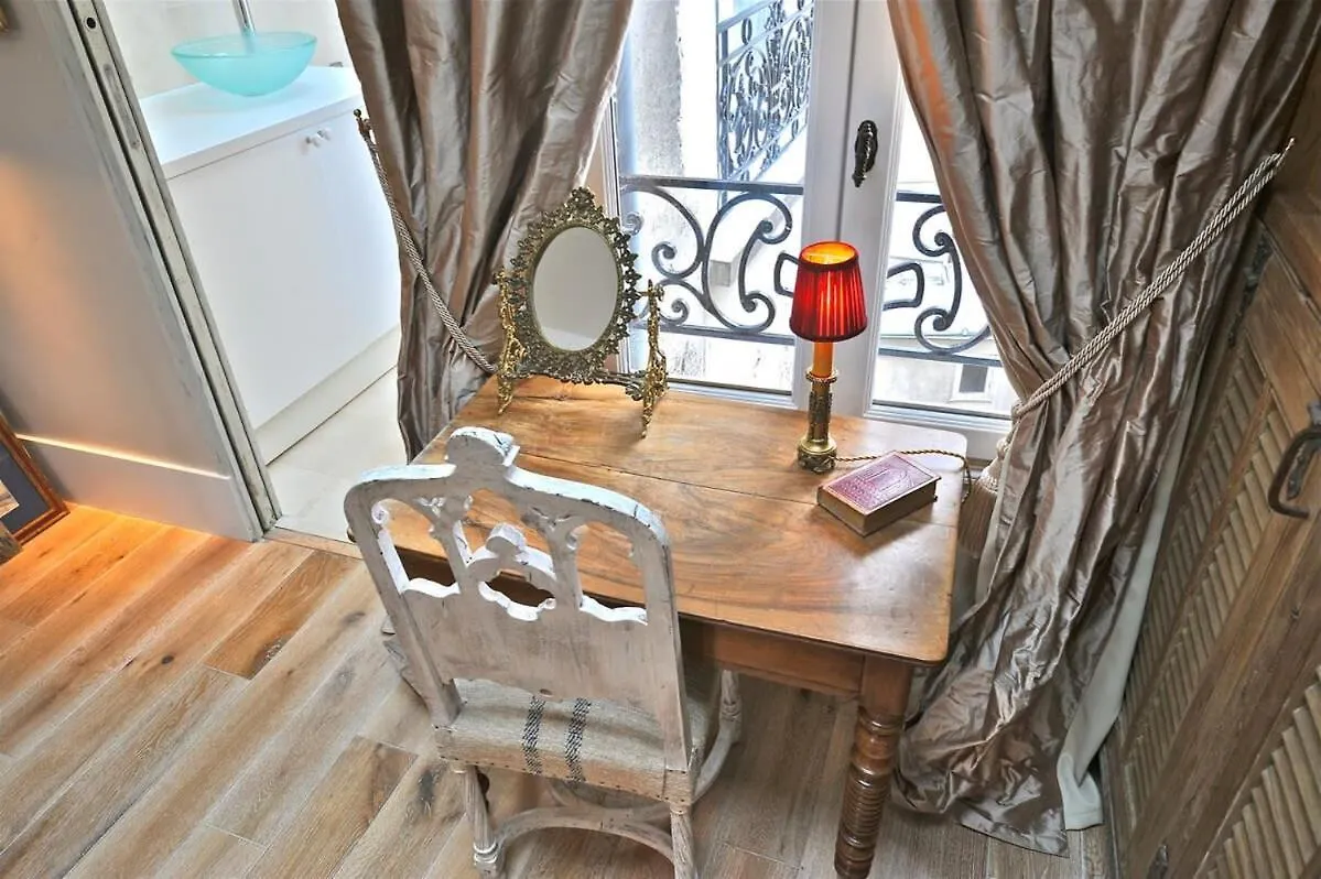 A Balcony On Notre Dame Apartment Paris