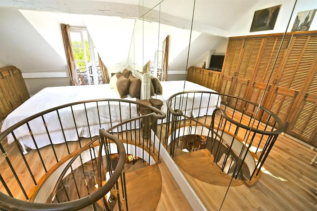 A Balcony On Notre Dame Apartment Paris